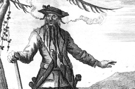 Sketch of Blackbeard with lit fuses in his beard.