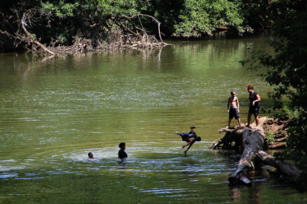 Residents play in the Conestoga River.