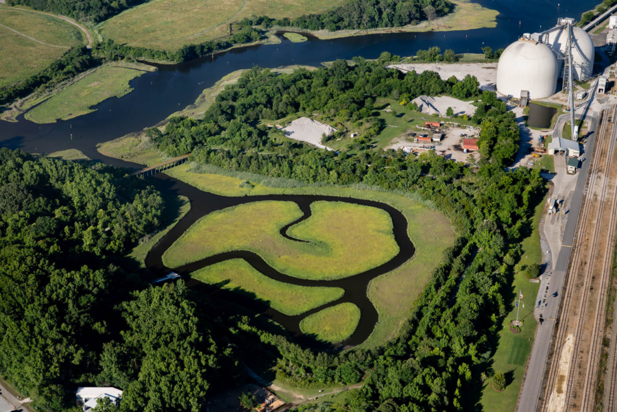 Aerial view of restored wetland with a looping water trail.