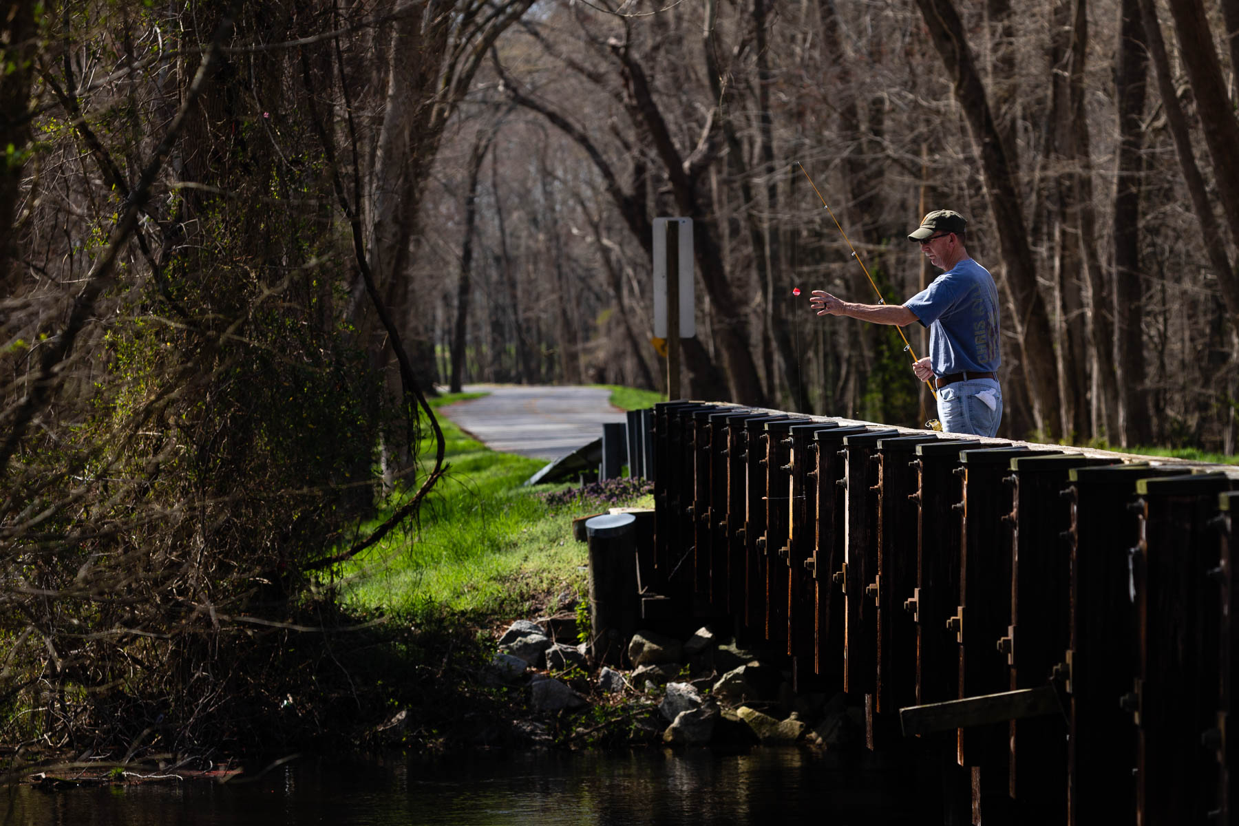Man fishing in the Pocomoke River.