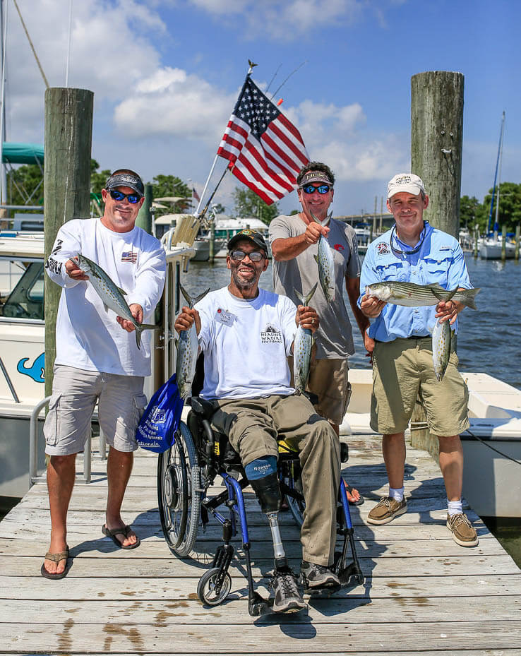 Veterans gather during a fishing event.