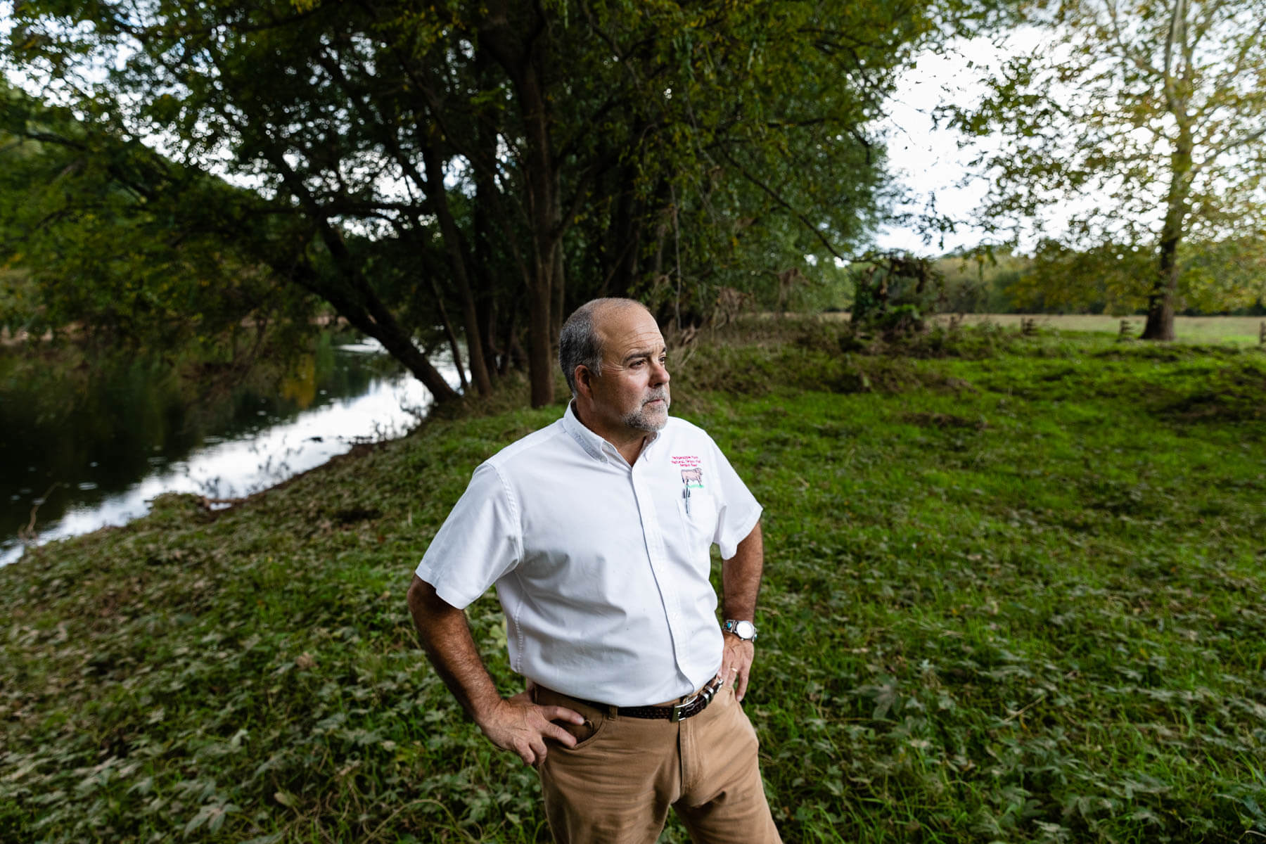 Dr. Scott Barao stand in front of the Monocacy River.